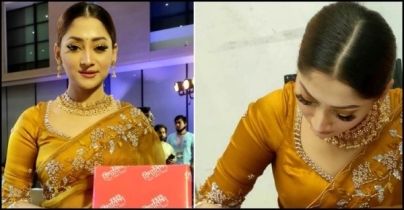 বঙ্গবাজারের পোড়া কাপড় কিনলেন পূজা